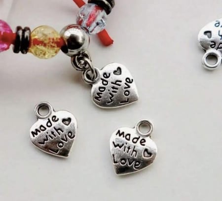 لوجو معدني بـ3 اشكال عشوائية 12 حبة