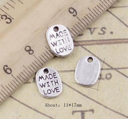 لوجو معدني بـ3 اشكال عشوائية 12 حبة