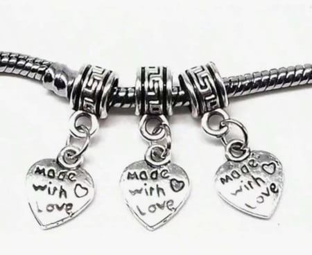 لوجو معدني بـ3 اشكال عشوائية 12 حبة