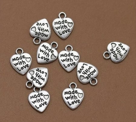 لوجو معدني بـ3 اشكال عشوائية 12 حبة