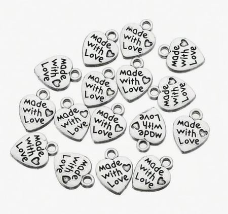 لوجو معدني بـ3 اشكال عشوائية 12 حبة