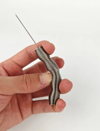 بالجملة - خرامة قصدير الشيشة من الحديد على شكل نابض زنبرك سستة 1كرتون*20كيس*50حبة (1000حبة)