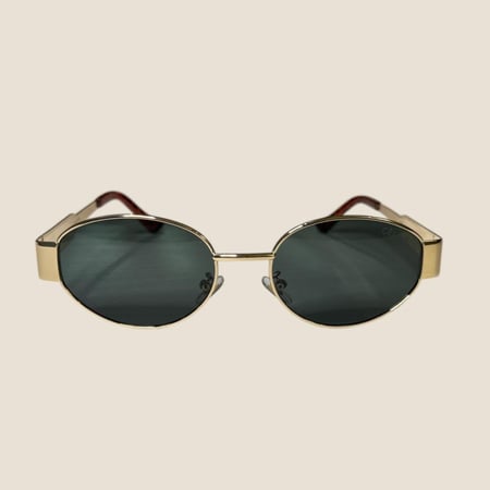 نظارة سيلين باللون الذهبي وعدسة باللون الاخضر بأطراف تايقر