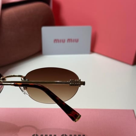 نظارة ميو ميو بدون إطار عدسة بيضاوية بنية