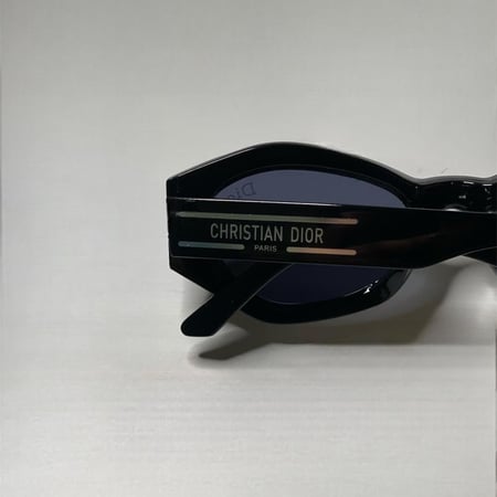 نظارة كريستN ديوR اسود كامل بشعار فضي