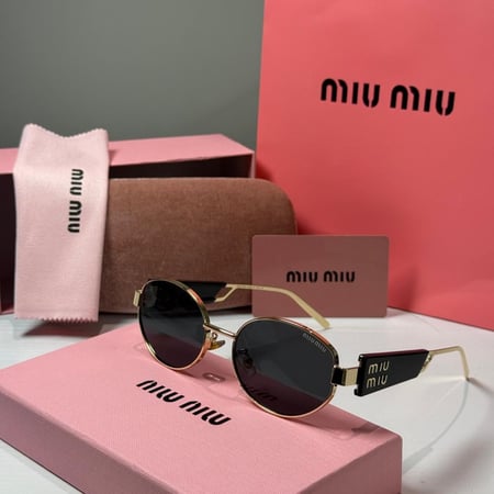 نظارة ميو ميو بعدسة دائرية باللون الذهبي والاسود