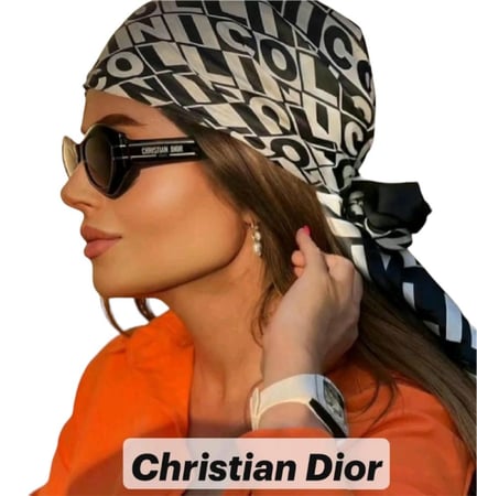 نظارة كريستN ديوR اسود كامل بشعار فضي