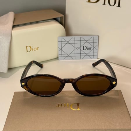 نظارة كرستن ديور بيضاوي باللون التايقر وعدسة بني