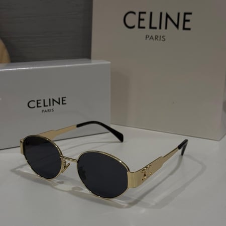 نظارة سيليN  باللون الذهبي وإطار بيضاوي بعدسة سوداء