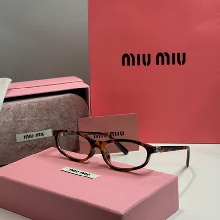 نظارة ميو ميو Line باللون التايقر وعدسة شفافة