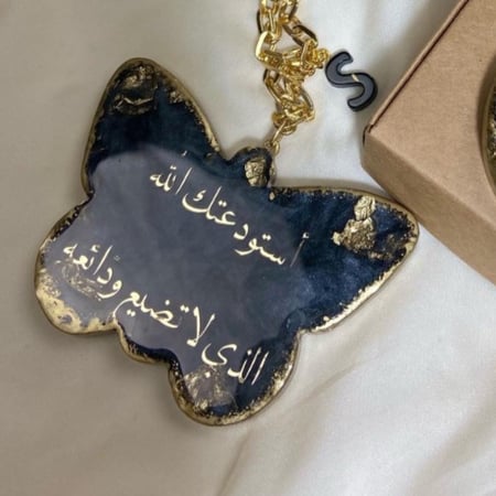 تعليقة سيارة شكل فراشه