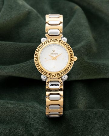 ساعة نسائية انيقة تصميم ذهبي فضي