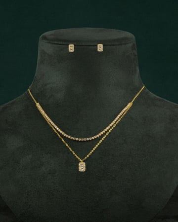 طقم شوكر سلسال وحلق مزين بالزركون تصميم ذهبي