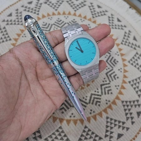 طقم ساعة قوتشي وقلم كارتير