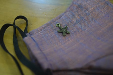 اضافة اكسسوار معدني للكمامة