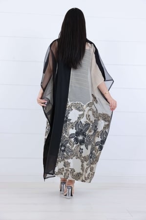 ظهر الجلابية بتفاصيل شيفون وانسيابية الحركة