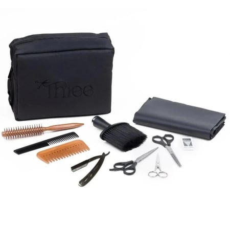 شنطة حلاقة من ثري ( مع جميع المكائن)