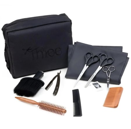 شنطة حلاقة من ثري ( مع جميع المكائن)