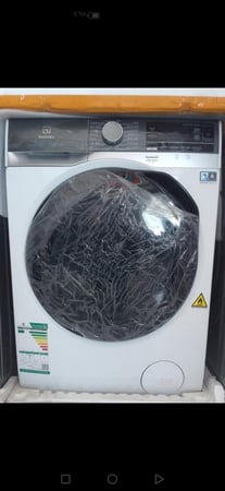 غساله الكترولكس ٨ كيلو فتحه اماميه تنشيف ١٠٠٪ لون ابيض