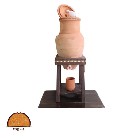 زير فخار مع عوامه