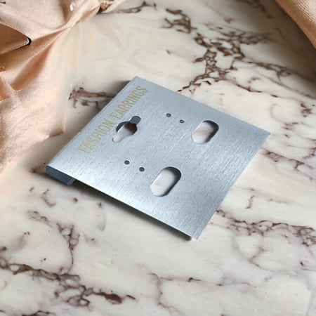 كرت عرض حلق فضي بلاستيك (50حبة) C-02021