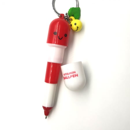 كبسولة ميدالية المفاتيح - قلم