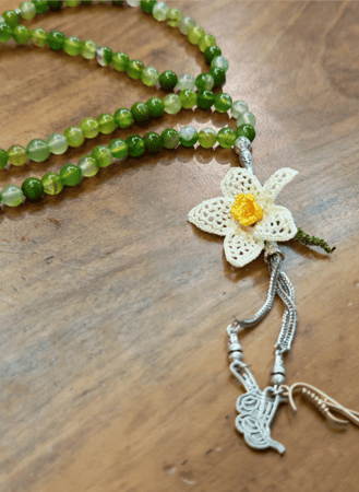 سبحة 99 عقيق برازيلي أخضر فستقي مزينة بوردة أويا كروشيه