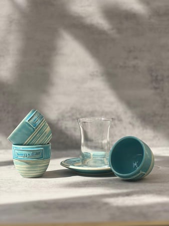 طقم فناجيل قهوة و شاي مصنوع يدويا  بالفخار الايطالي ( خالي من الرصاص)  بعبارة " استبشر خيرا"  العدد 6 من كل صنف 34E