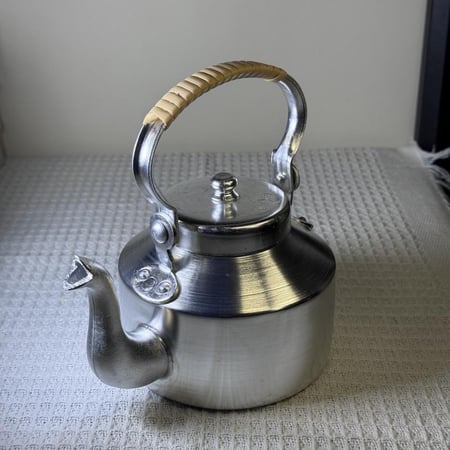 ابريق ابو تاج الاصلي ختمين  معدل مقاس 10