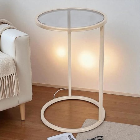 طاولة خدمة دائرية بلون شمباني بسطح زجاجي شفاف – شفافية أنيقة تضيء المكان tl