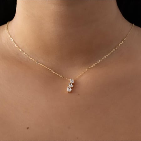 48| عقد بثلاث أحجار