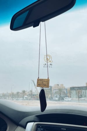 تعليقة لوحة سيارة مع عود