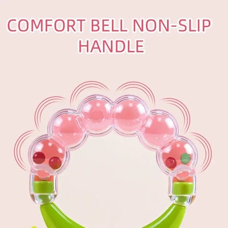 حلقة لتغذية الفاكهة للطفل مع خشخيشة . ملونة