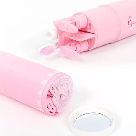 منظم فرشاة ومعجون مع مستلزمات لون وردي