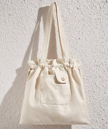 شنطة تسوق قماش بيضاء متعددة الجيوب بحزام غلق