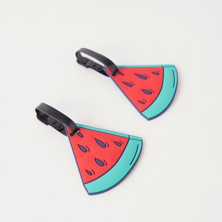 تاق حقيبة السفر مصممة علي شكل بطيخ