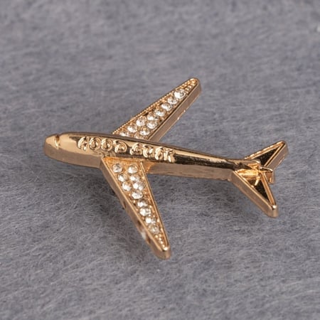 بروش طائرة ذهبي بالكريستال