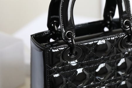 Small LADY DIOR handbag black glossy patent leather cowhide cannage pattern