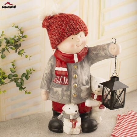 ديكور ولد حامل فانوس