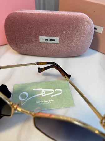 نظارات شمسية Miu Miu MU