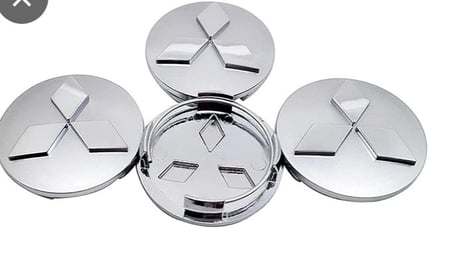 4قطع غطاء محور اطارات لسياره مستوبيشي