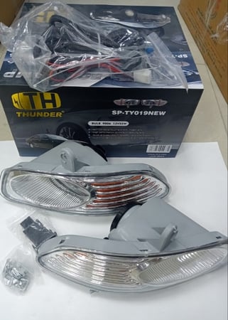 طقم كشافات ضباب كامري اورنج موديل 2005-2006