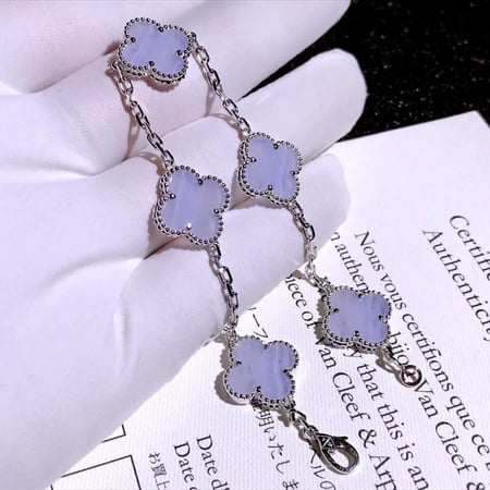 اسوارة فضية 5 وردات لون ازرق رخامي1