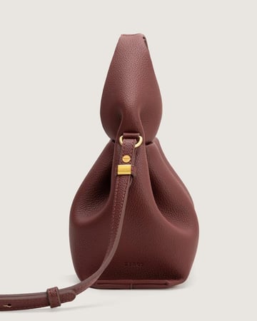 شنطة أمجاد النسائية جلد باللون العودي