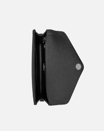 شنطة نسائية من الجلد بلون أسود