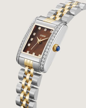 ساعة مجد النسائية ستيل بلون ذهبي وفضي