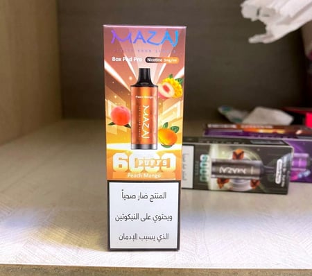 Peach Mango  نكهة خوخ مانجو من MAZAJ 6000 Puffs