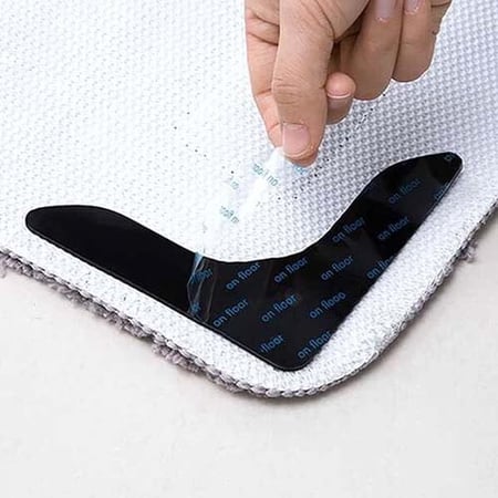 مثبت السجاد والموكيت على السيراميك والباركية بواسطة لاصق بمنع الانزلاق