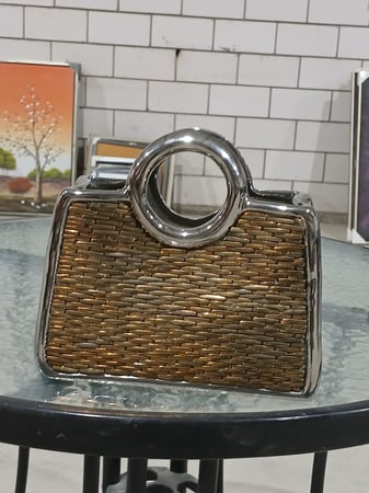 مزهرية شكل شنطة