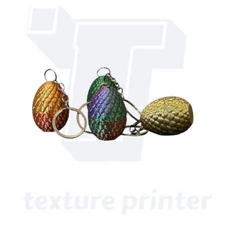 ميدالية بيضة دراجون صغيرة - mini dragon egg keychain